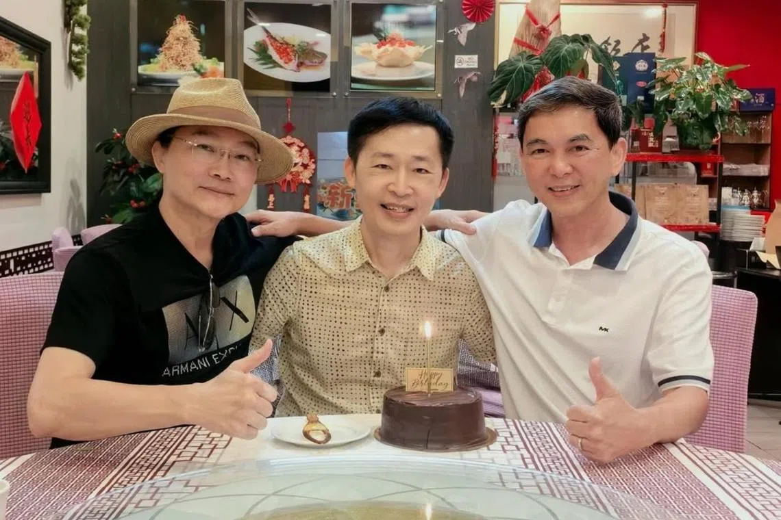 Dr Liang Wern Fook (centre) celebrating his 62nd birthday with old friends Liu Rui Zheng (left) and Wang Bang Ji in April. The three are the original singers of the xinyao song Friends Forever.