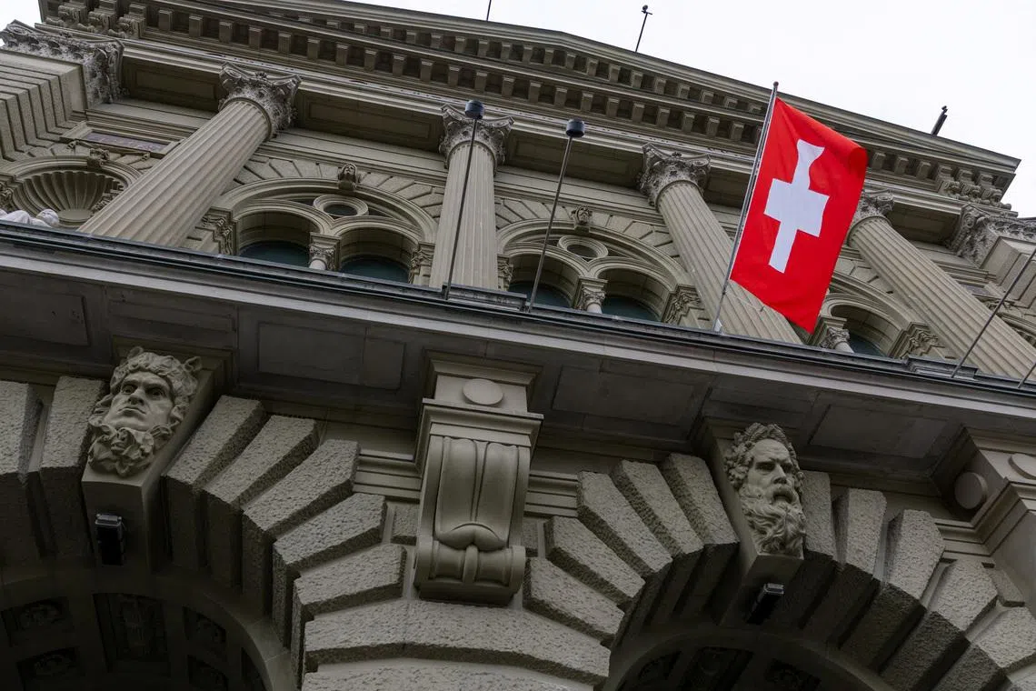 A Swiss flag hangs at the Swiss Parliament building (Bundeshaus) in Bern, Switzerland, March 12, 2025. REUTERS/Denis Balibouse
