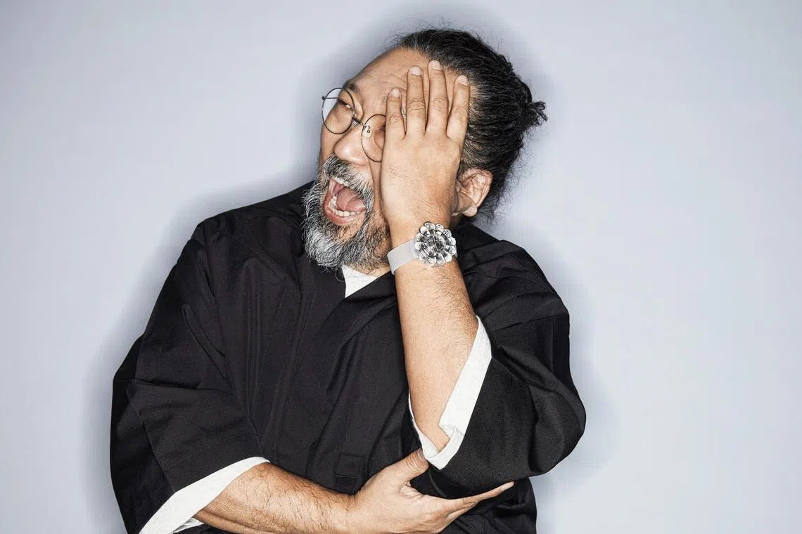 Takashi Murakami wearing the MP-15 Tourbillon Sapphire, his collaboration with Swiss watchmaker Hublot. 