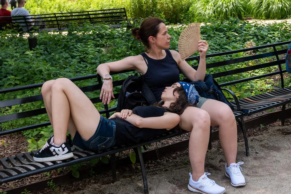 People trying to stay cool in Manhattan on June 23, 2025, in New York City. 
