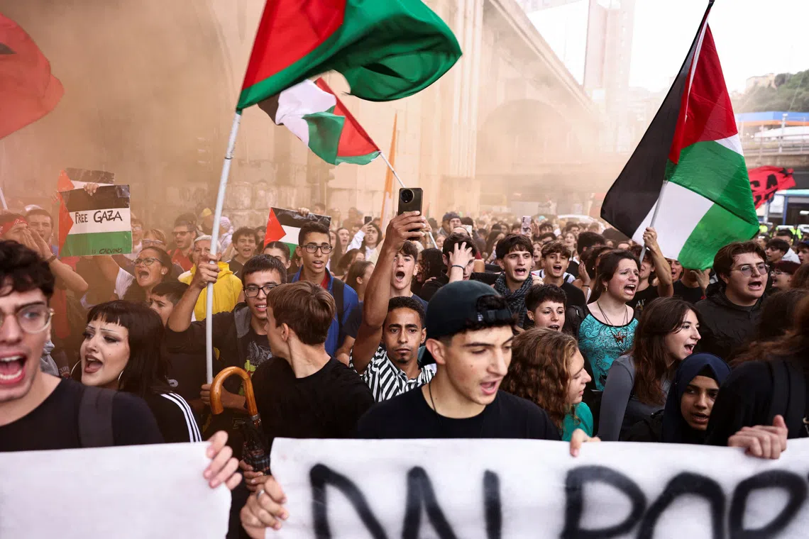 Students gather for a demonstration, as dockworkers take part in a strike near the port of Genoa as part of a nationwide \"Let's Block Everything\" protest, with activists calling for a halt to arms shipments to Israel, in Genoa, Italy, September 22, 2025. REUTERS/Matteo Minnella