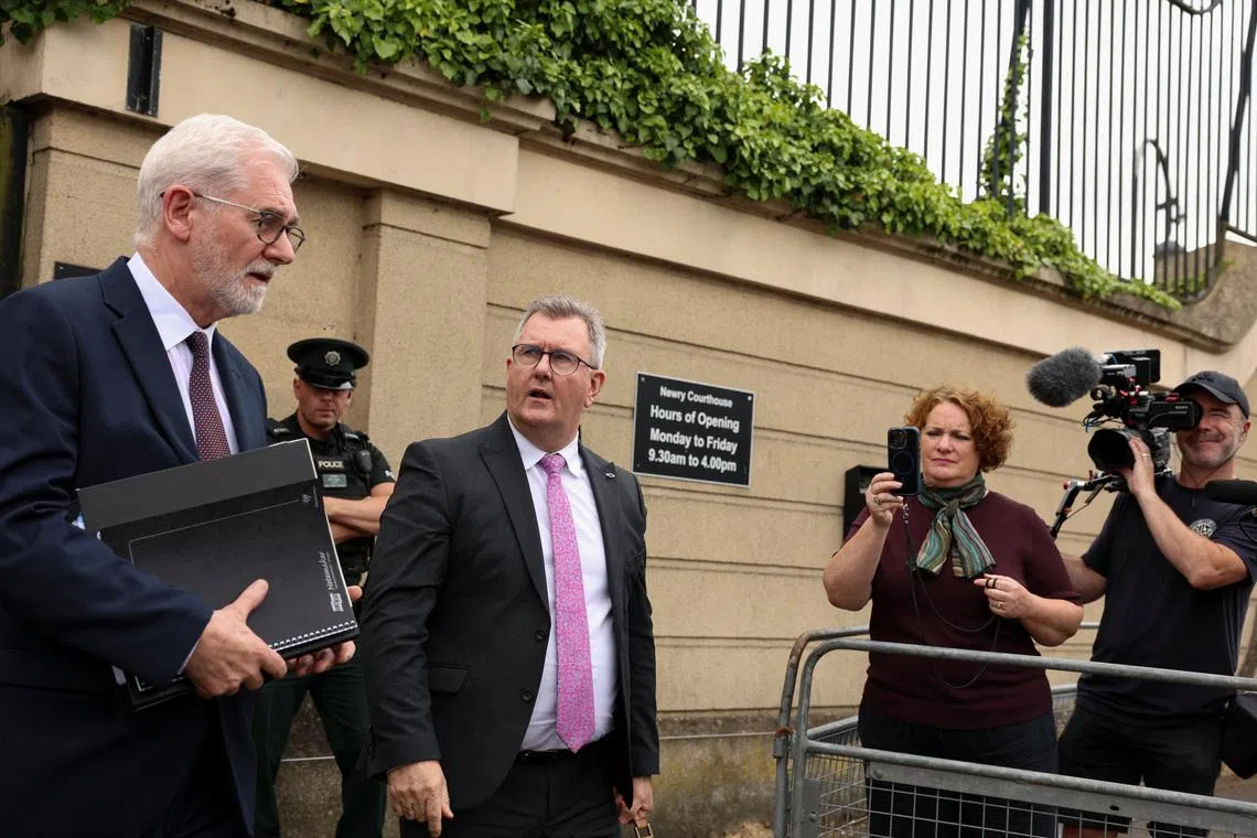 Jeffrey Donaldson, former leader of the Democratic Unionist Party (DUP), charged with historical sex offences, leaves the Newry Courthouse as he appeared for trial, in Newry, Northern Ireland, June 17, 2026. REUTERS/Cathal McNaughton
