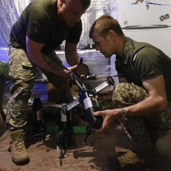 Ukrainian servicemen operating a Ukraine-made P1-Sun drone to intercept Russian 'Shahed' type, and other strike or reconnaissance drones in the north of the Kharkiv region, Ukraine.