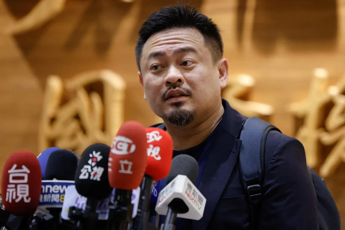 Taiwan minister says he was not 'belittled' on rare trip to China