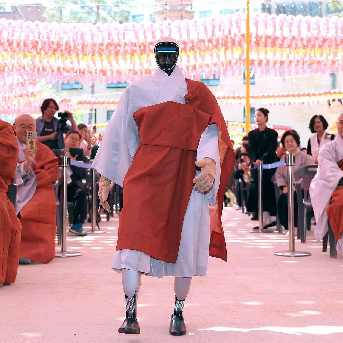 Gabi, a humanoid robot dressed as a Buddhist monk, attends an ordination ceremony as part of celebrations for the upcoming Buddha's birthday at Jogye Temple in Seoul on May 6, 2026.