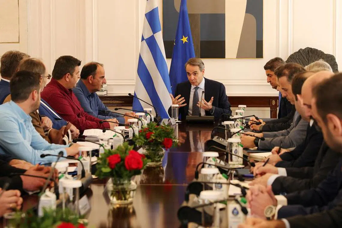 Greek Prime Minnister Kyriakos Mitsotakis meets with protesting farmers at the Maximos Mansion in Athens, Greece, February 13, 2024. REUTERS/Louiza Vradi