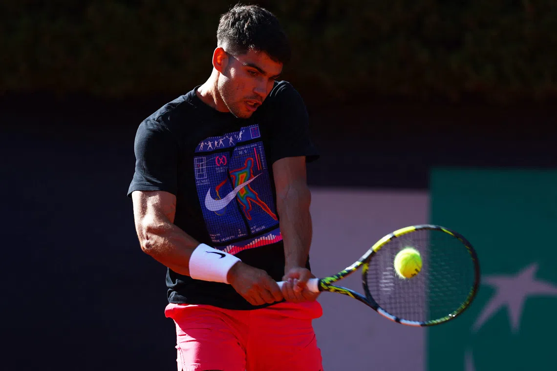 FILE PHOTO: Tennis - Italian Open - Foro Italico, Rome, Italy - May 6, 2025 Spain's Carlos Alcaraz during training REUTERS/Yves Herman/File Photo