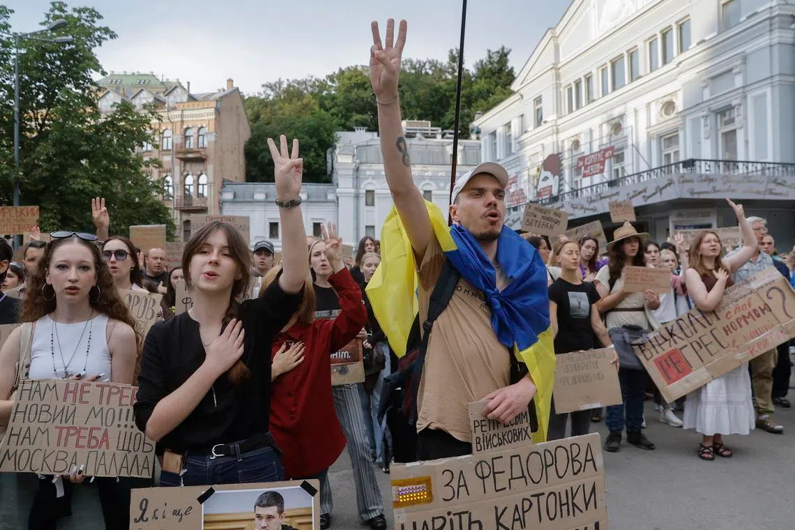 Ukrainians protest against the dismissal of Ukrainian Defence Minister Mykhailo Fedorov in downtown Kyiv, on July 24.