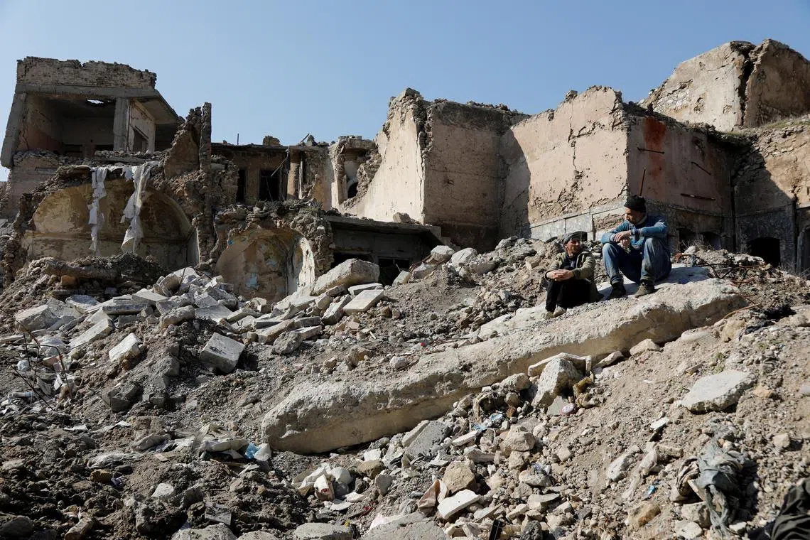 FILE PHOTO: A view of the old city of Mosul and buildings destroyed during past fighting with Islamic State militants, in Mosul, Iraq February 1, 2022. REUTERS/Khalid al-Mousily/File Photo