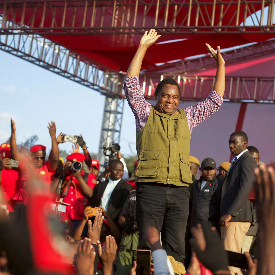 FILE PHOTO: Zambia's President Hakainde Hichilema greets United Party for National Development (UPND) supporters during their election campaign launch in Lusaka, Zambia, June 28, 2026. REUTERS/Moses Mwape/File Photo