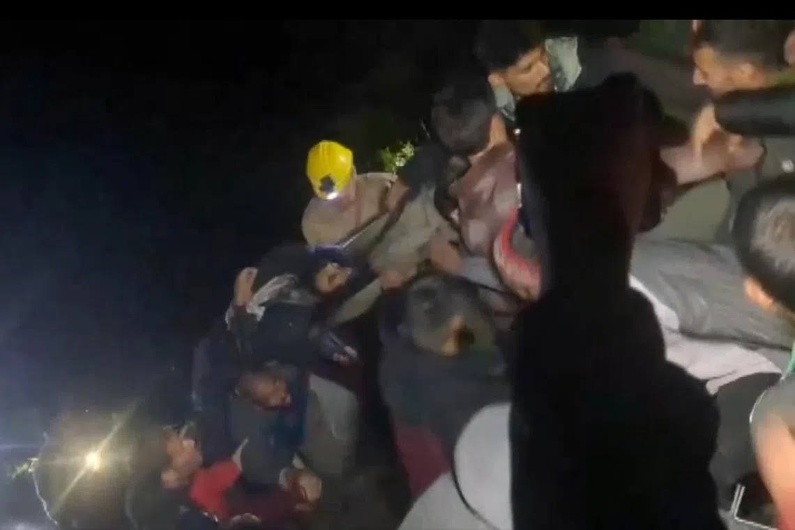 A screenshot from a video posted online shows a victim on a stretcher being hauled to safety after the April 4 accident.