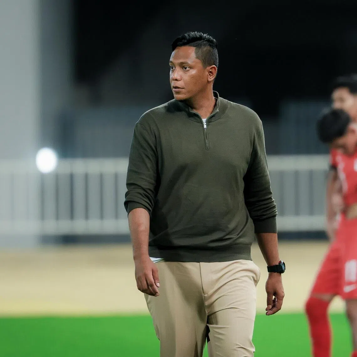 Singapore men?s under-22 football head coach Firdaus Kassim and his players reacting after the final whistle during the group match at the Rajamangala National Stadium during the Thailand Southeast Asian Games in Bangkok on Dec 6, 2025.