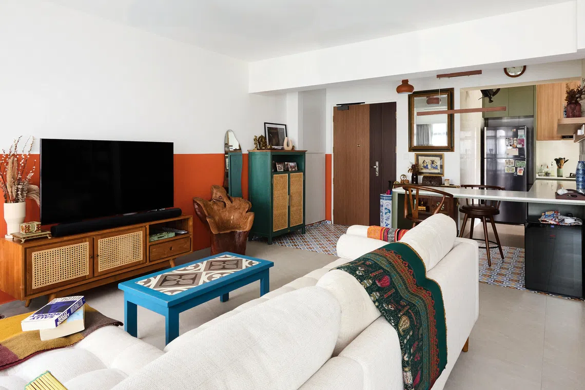 This funky flat has tropical touches throughout the decor.