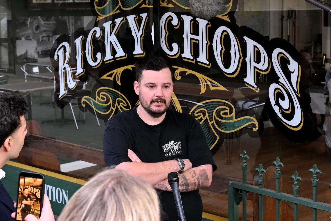 Barber Ricky Jefferies speaking to the media a day after tackling a man who attacked Australian politician Helen Haines.