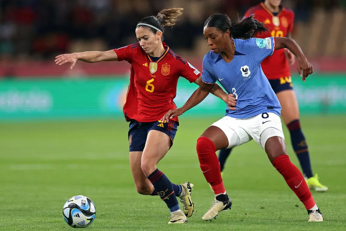 Spanish midfielder Aitana Bonmati (left) vies for the ball with French midfielder Grace Geyoro during the Uefa Women's Nations League final.