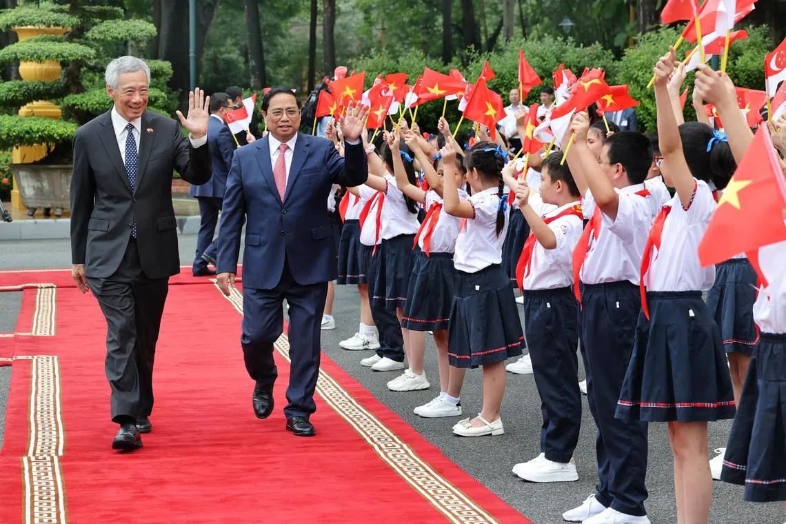 Prime Minister Lee Hsien Loong was welcomed by Vietnamese Prime Minister Pham Minh Chinh at the Presidential Palace in Hanoi on August 28, 2023. PM Lee’s three-day official visit coincides with the 50th anniversary of bilateral diplomatic relations and the 10th year of the strategic partnership.