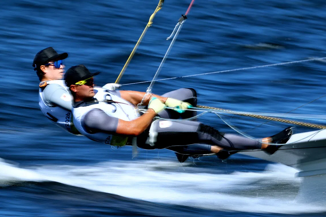 Asian Games - Aichi-Nagoya 2026 - Sailing - Kaiyoh Yacht Harbor, Gamagori, Japan - October 1, 2026 Japan's Teruaki Shimakura and Shintaro Kamisonoda in action during the Men's Skiff Opening Series REUTERS/Issei Kato TPX IMAGES OF THE DAY