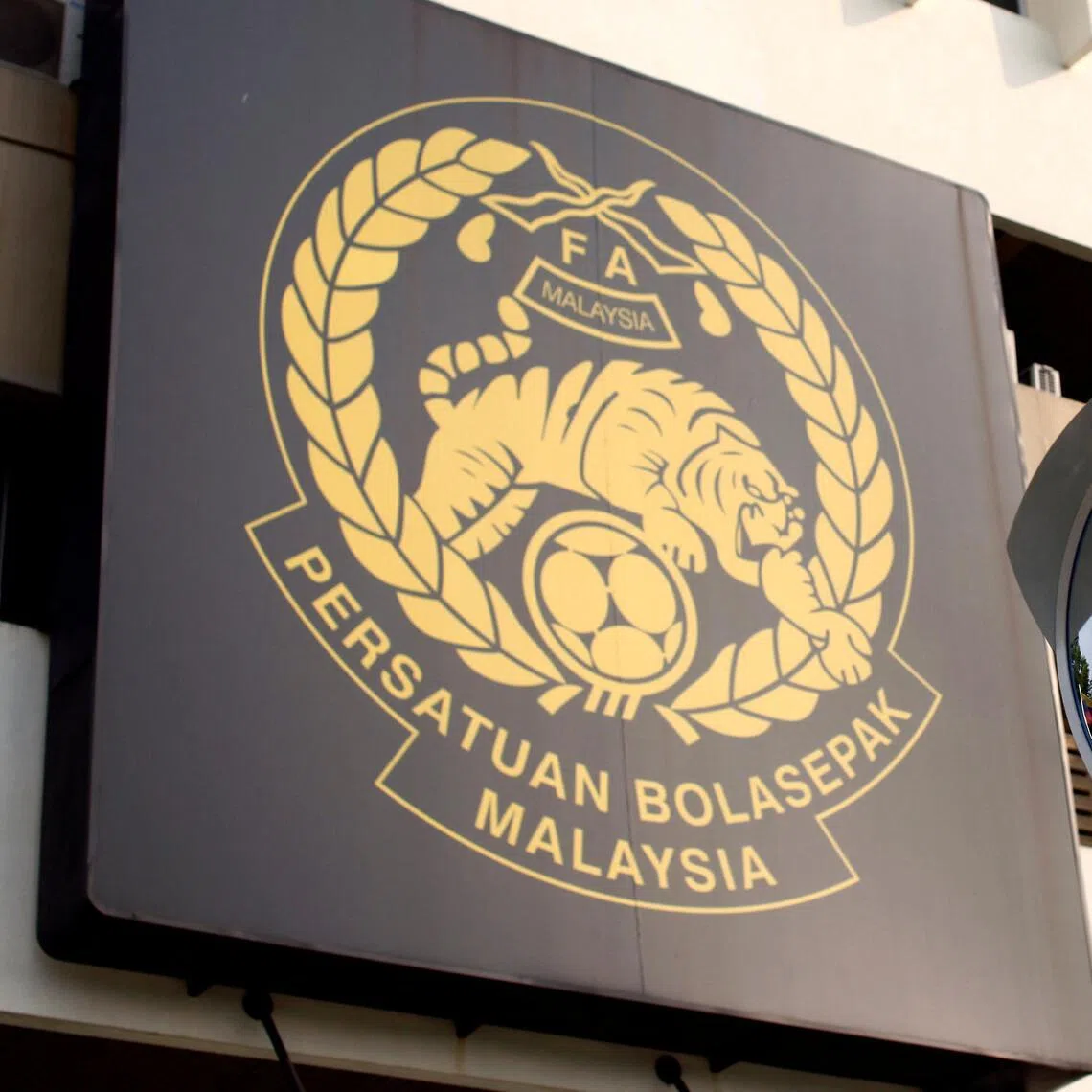 FILE PHOTO: The logo of the Football Association of Malaysia (FAM) is pictured at their headquarters in Kuala Lumpur February 5, 2014. REUTERS/Samsul Said/File Photo