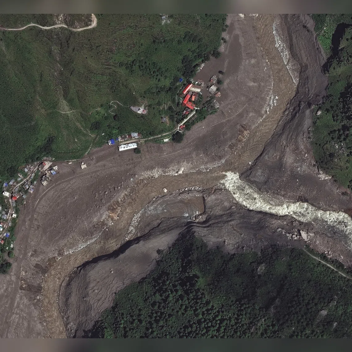 An area along the Trishuli River, near where buildings and bridges were swept away following flash floods and a mudslide, in Syapru Besi, Nepal.