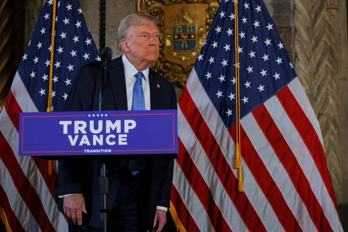 U.S. President-elect Donald Trump looks on as he delivers remarks at Mar-a-Lago in Palm Beach, Florida, U.S., December 16, 2024. REUTERS/Brian Snyder/File Photo