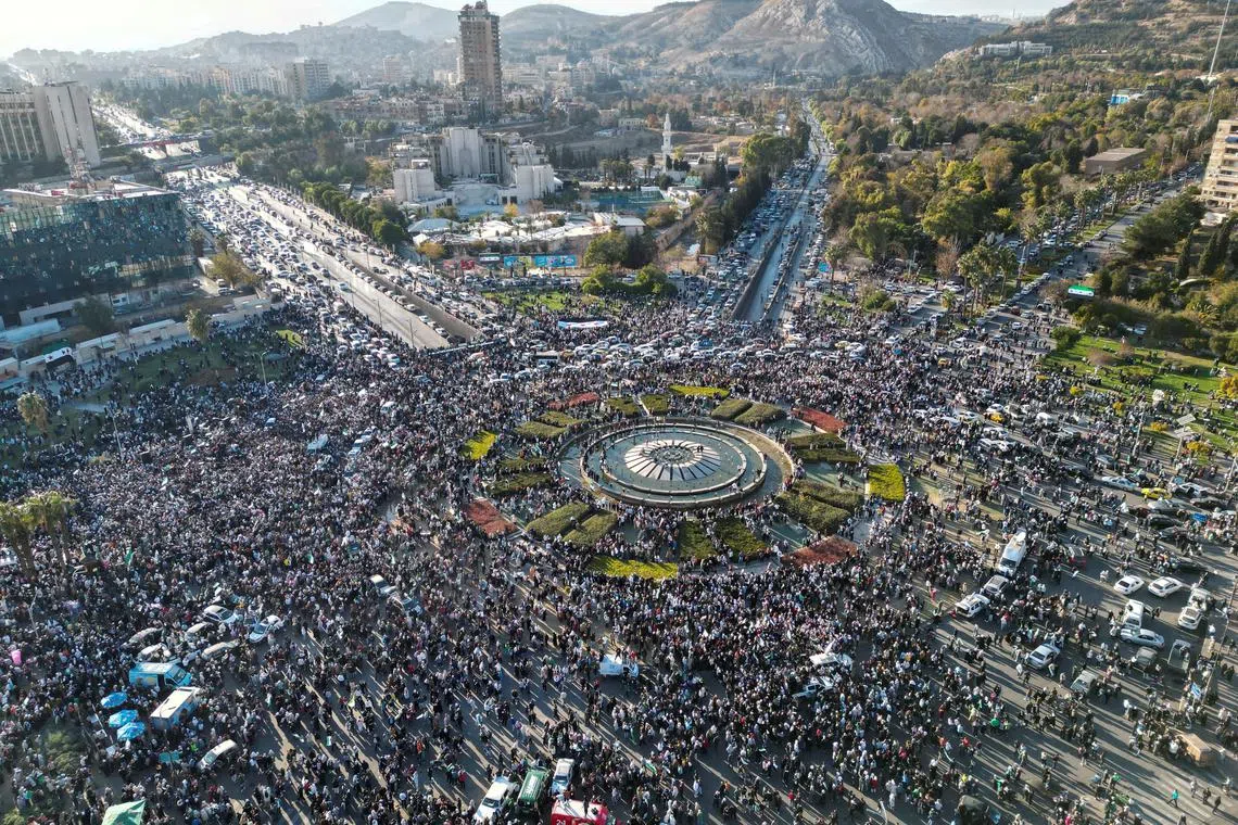 A drone view shows Damascus city, after fighters of the ruling Syrian body ousted Bashar al-Assad,  Syria, December 13, 2024. REUTERS/Yosri Al Jamal