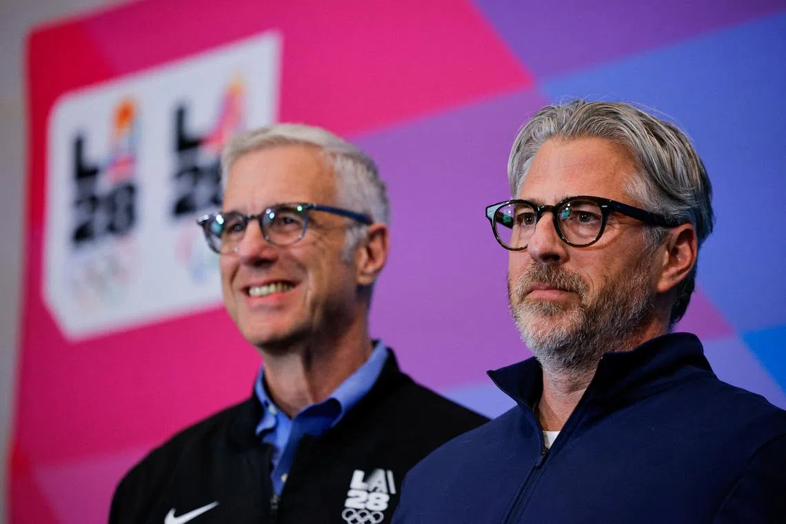 LA28 Chief Executive Officer Reynold Hoover and LA28 Chairperson and President Casey Wasserman pose following a press conference updating progress on the 2028 Olympic Games, in Los Angeles, California, U.S., June 4, 2026.  REUTERS/Mike Blake