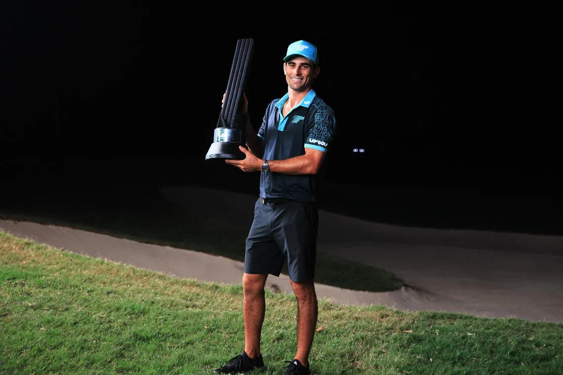 Joaquin Niemann posing with the trophy after winning the LIV Golf Mayakoba.