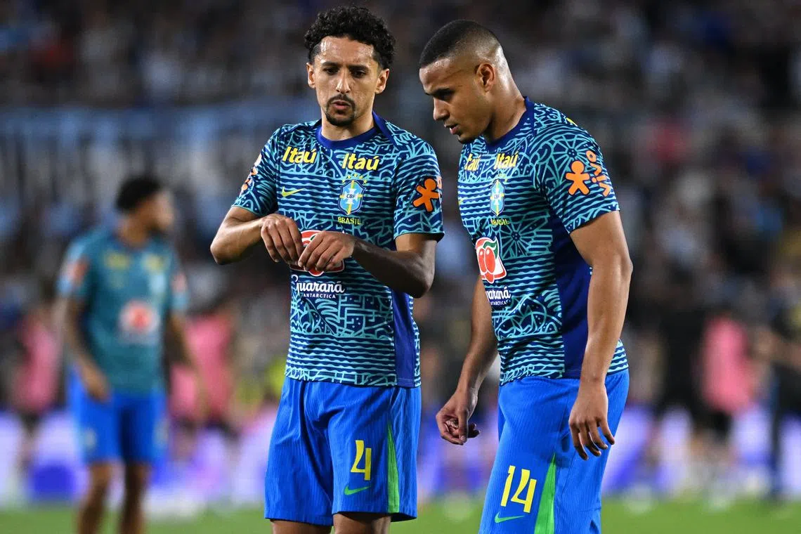 Soccer Football - World Cup - South American Qualifiers - Argentina v Brazil - Estadio Mas Monumental, Buenos Aires, Argentina - March 25, 2025 Brazil's Marquinhos and Murillo during the warm up before the match REUTERS/Rodrigo Valle/File Photo