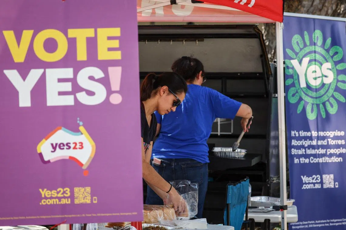 Supporters of the YES campaign at their booth in the centre of the Northern Territory capital city of Darwin on Aug 30, 2023.