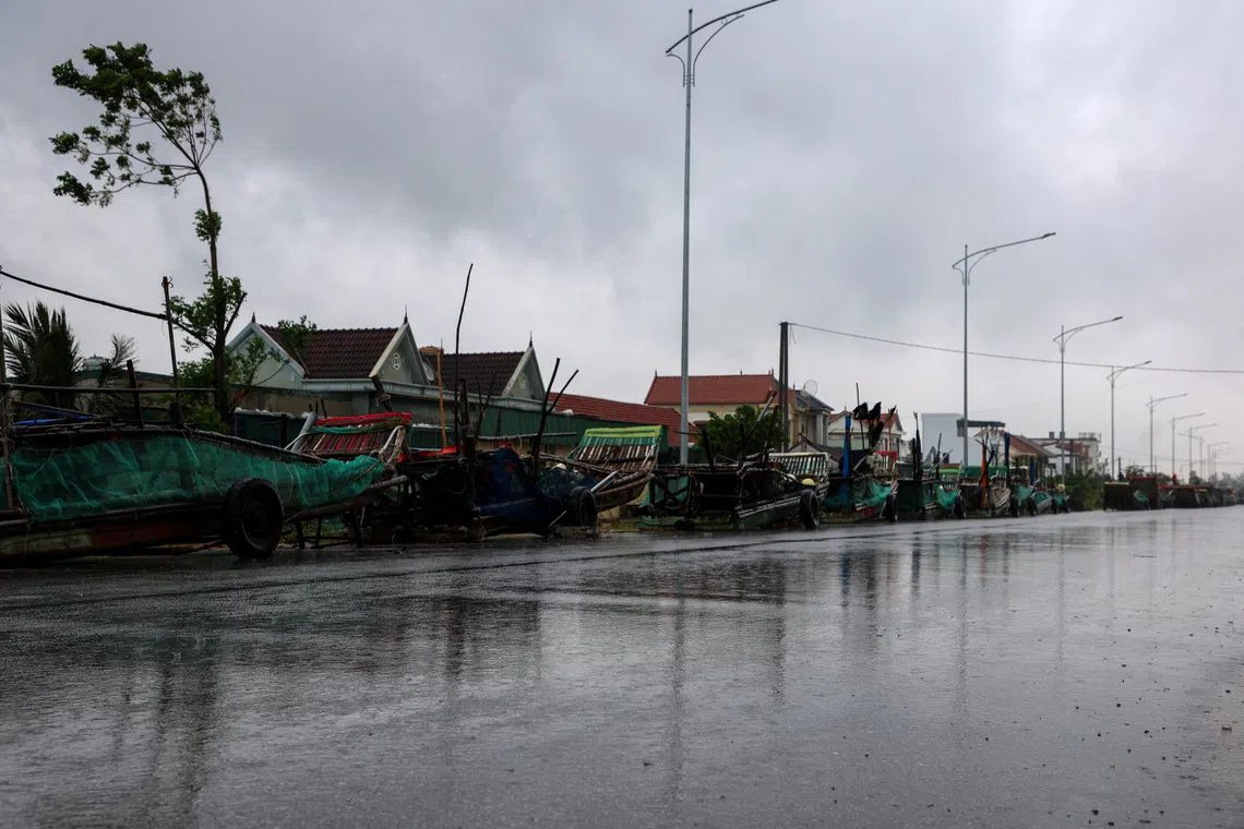 Boats are kept on a road as Typhoon Bualoi nears, in Nghe An province, Vietnam, September 28, 2025. REUTERS/Thinh Nguyen