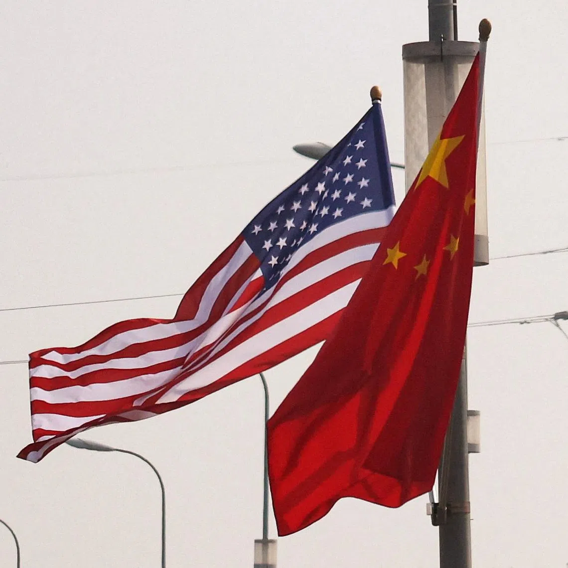 China’s Minister of Public Security, Wang Xiaohong, and FBI Director Kash Patel met in Beijing on July 24.