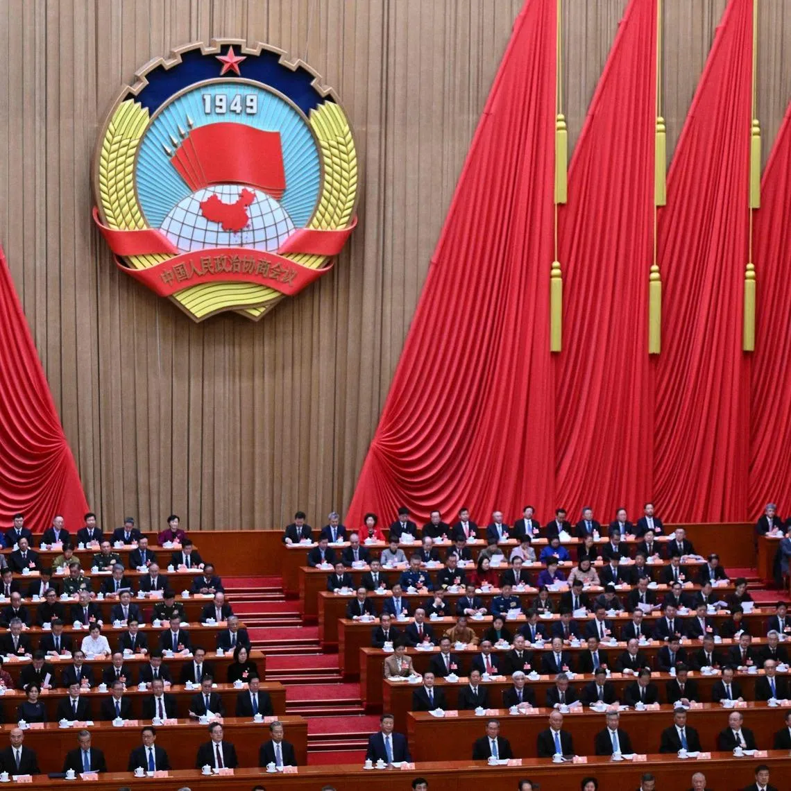 China's President Xi Jinping (centre) chairs the opening ceremony of the CPPCC at the Great Hall of the People in Beijing on March 4.