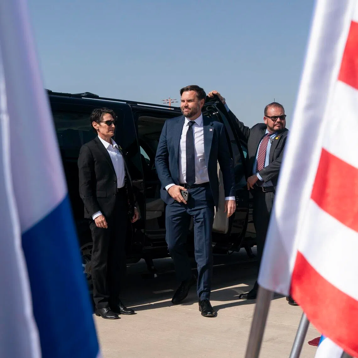 US Vice-President J.D. Vance arriving with Secret Service agents to board Air Force Two in Israel in 2025.