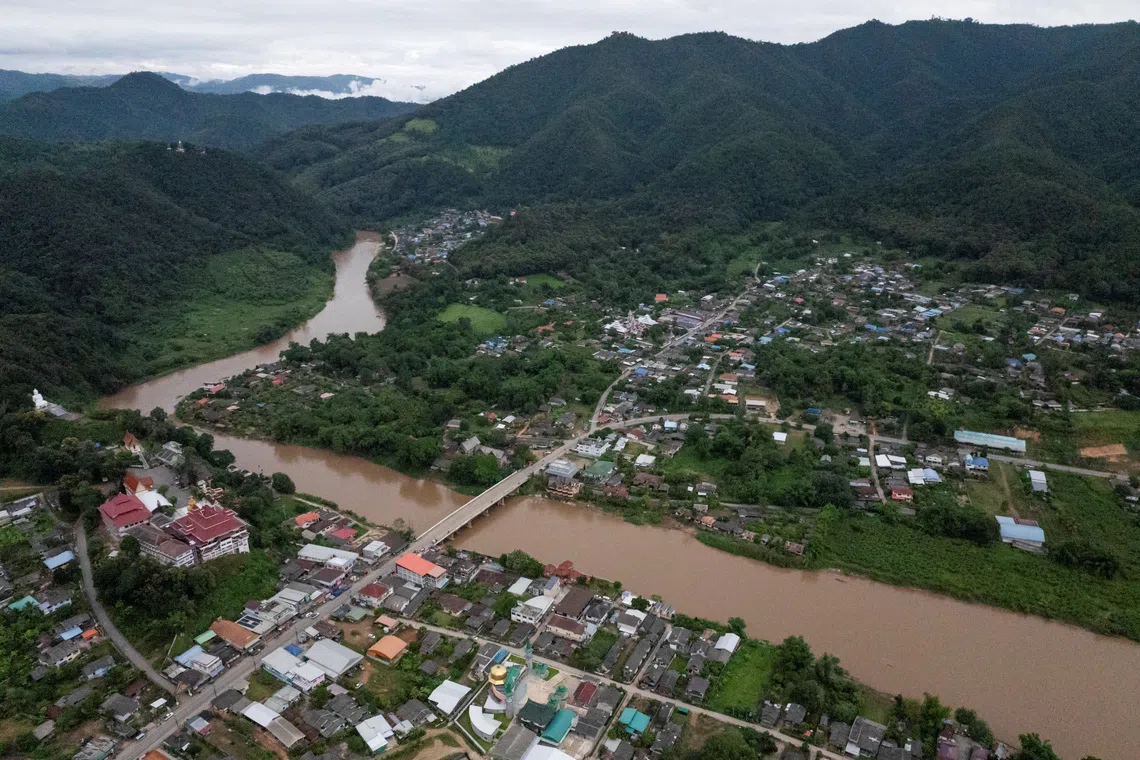 A drone view shows the Kok River, which flows through Tha Ton village in northern Thailand's Chiang Mai province after entering Thailand from Myanmar and has become the main water source across Chiang Mai and Chiang Rai province, amid increased rare earth and gold mining at the river’s source in Myanmar, where unregulated operations may release toxic chemicals, according to the Stimson Center report, November 5, 2025. REUTERS/Chalinee Thirasupa
