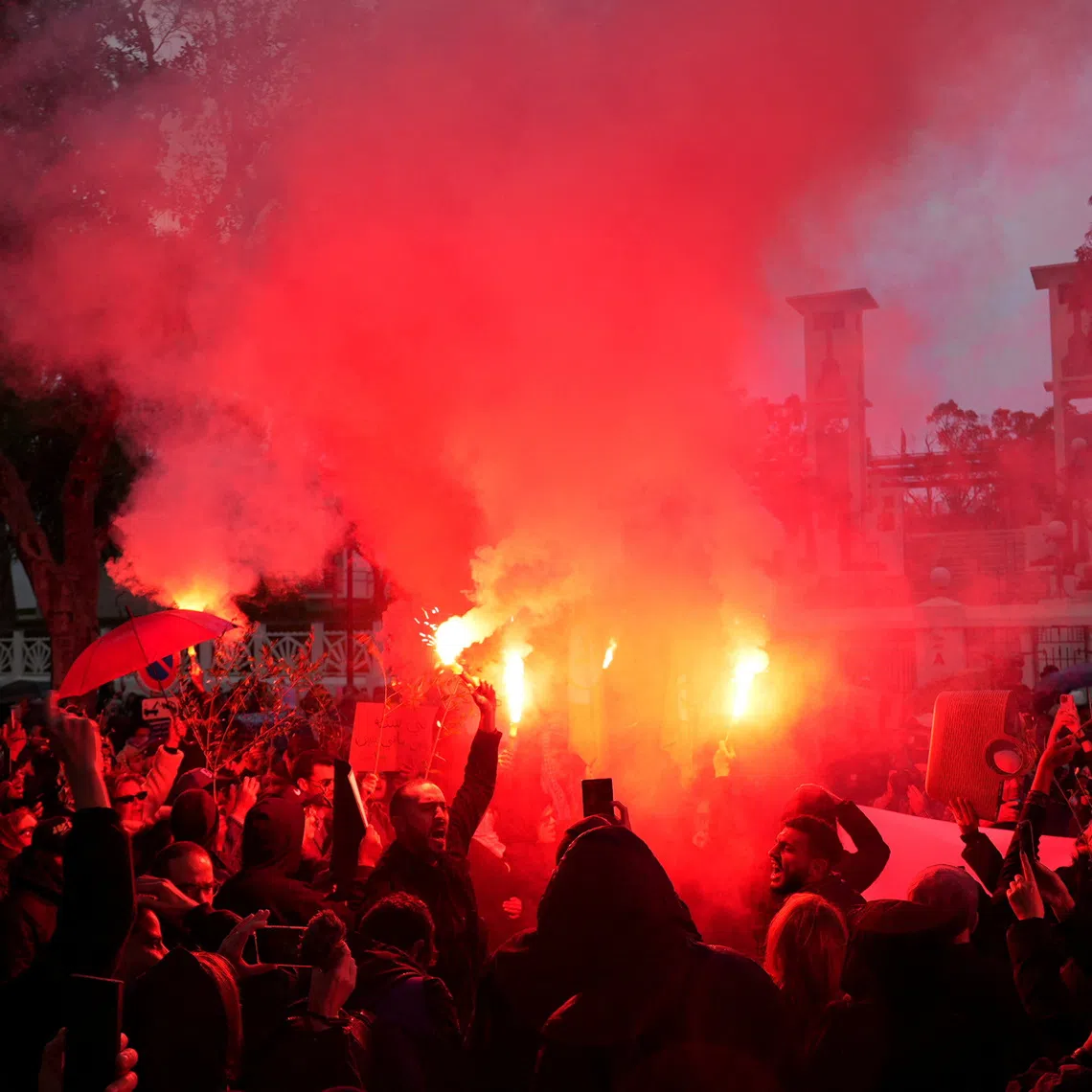 Protesters take part in a protest against Tunisia's President Kais Saied, accusing him of entrenching one-man rule through the use of the judiciary and police, in Tunis, Tunisia November 22, 2025. REUTERS/Jihed Abidellaou