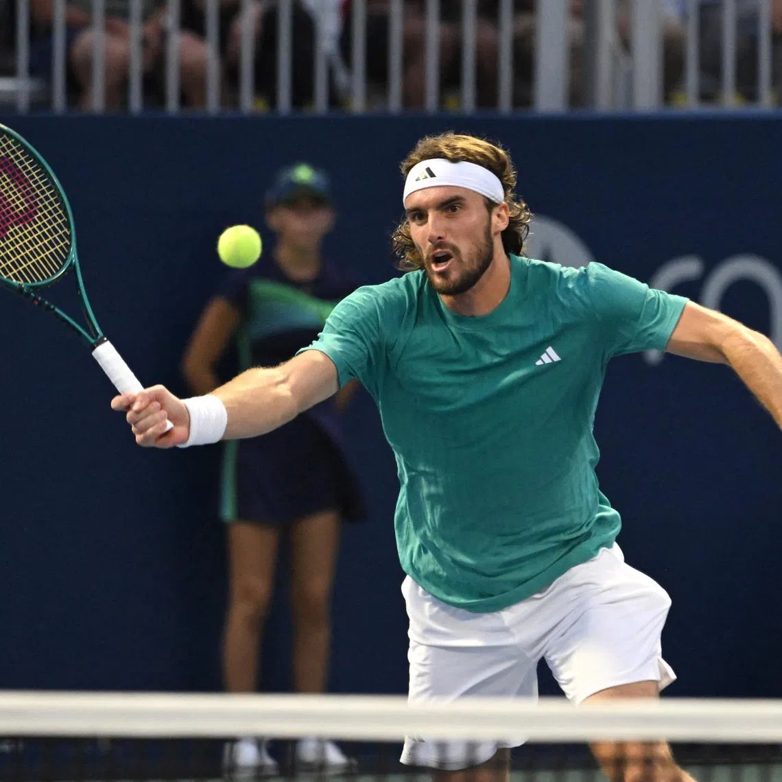 Jul 30, 2025; Toronto, ON, Canada;  Stefanos Tsitsipas (GRE) plays a shot against Christopher O'Connell (AUS) during second round play at Sobeys Stadium. Mandatory Credit: Dan Hamilton-Imagn Images