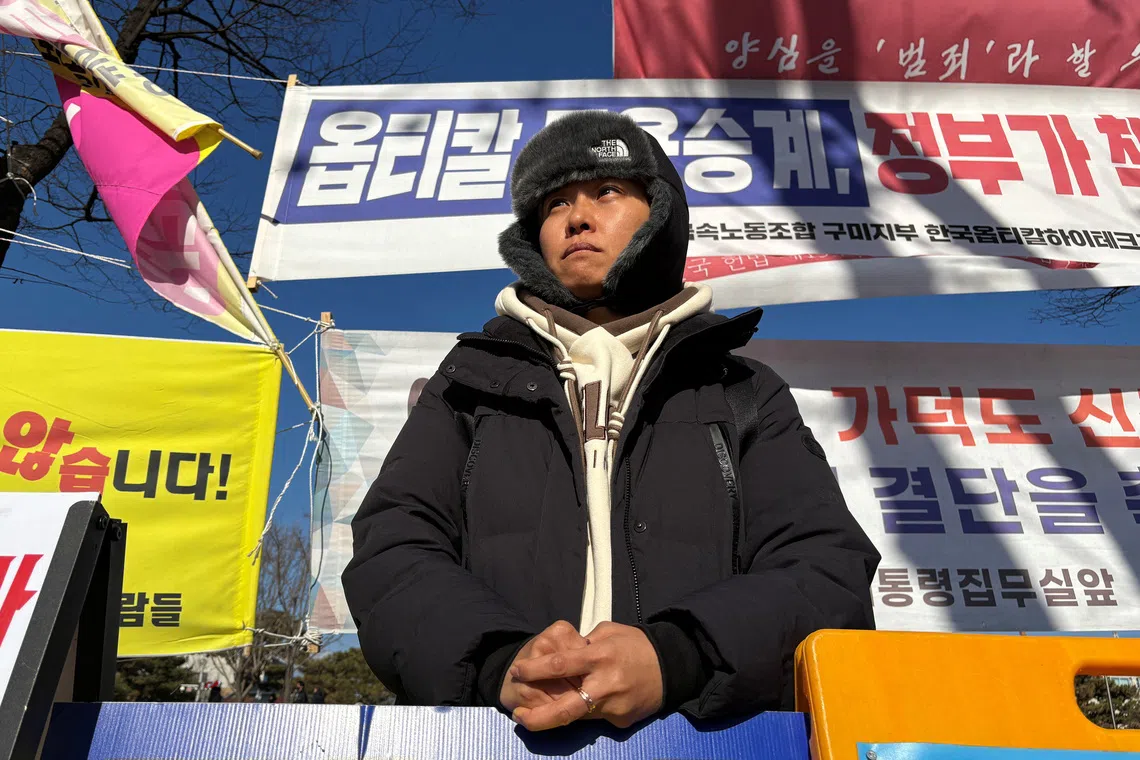 Ms Ryu Kum-ji, 42, who lost both parents in the plane crash, stages a solo protest near the Presidential Office in Seoul on Dec 25.
