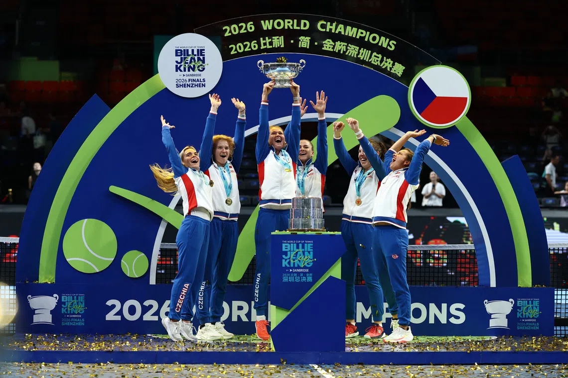 Tennis - Billie Jean King Cup Finals - Final - Ukraine v Czech Republic - Shenzhen Bay Sports Centre Arena, Shenzhen, China - September 27, 2026  Czech Republic's Linda Noskova, Karolina Muchova, Marie Bouzkova, Katerina Siniakova, captain Barbora Strycova, and a teammate celebrate with the Billie Jean King Cup after winning their final matches against Ukraine REUTERS/Tingshu Wang