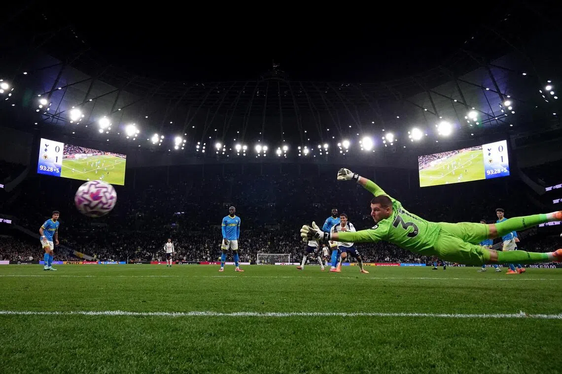 Tottenham Hotspur's Joao Palhinha scores the equaliser past Wolverhampton Wanderers' Sam Johnstone..