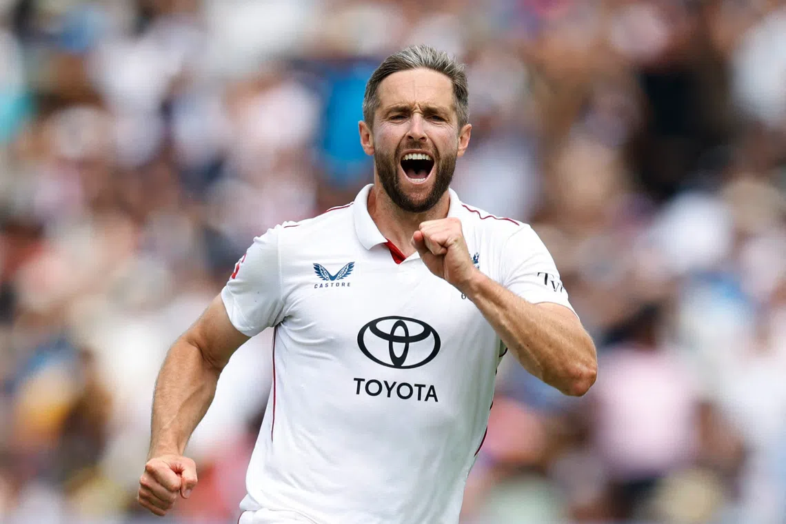 Cricket - International Test Match Series - Third Test - England v India - Lord's Cricket Ground, London, Britain - July 14, 2025 England's Chris Woakes celebrates after taking the wicket of India's Nitish Kumar Reddy Action Images via Reuters/Peter Cziborra