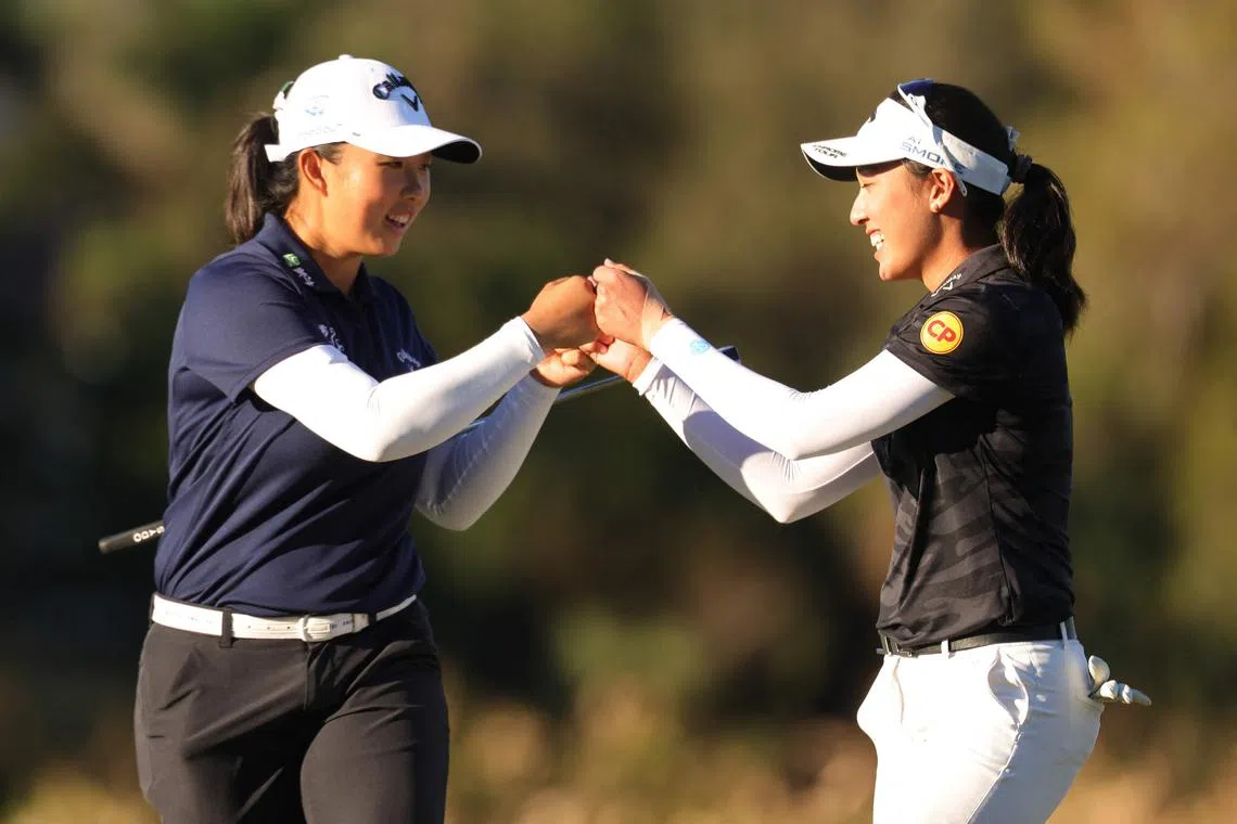 Yin Ruoning (left) of China and Jeeno Thitikul of Thailand reacting on the 17th green during the third round of the LPGA Tour Championship at Tiburon Golf Club on Nov 23 in Naples, Florida.