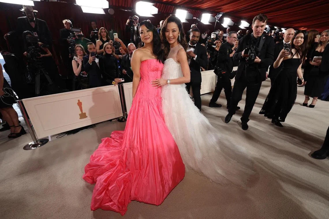 Stephanie Hsu (left) and Michelle Yeoh during the Oscars arrivals at the 95th Academy Awards.