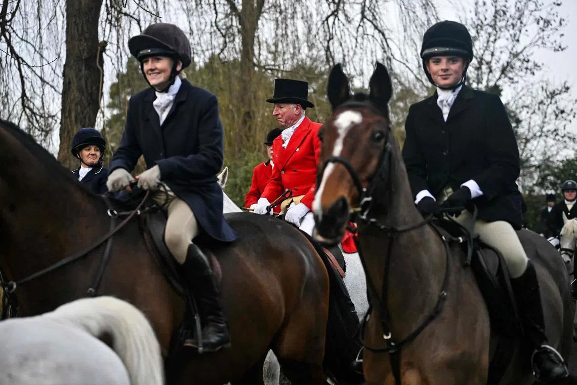 Members of the Old Surrey, Burstow and West Kent Hunt arriving to gather at Chiddingstone Castle for their annual Boxing Day hunt, south of London on Dec 26, 2023. 