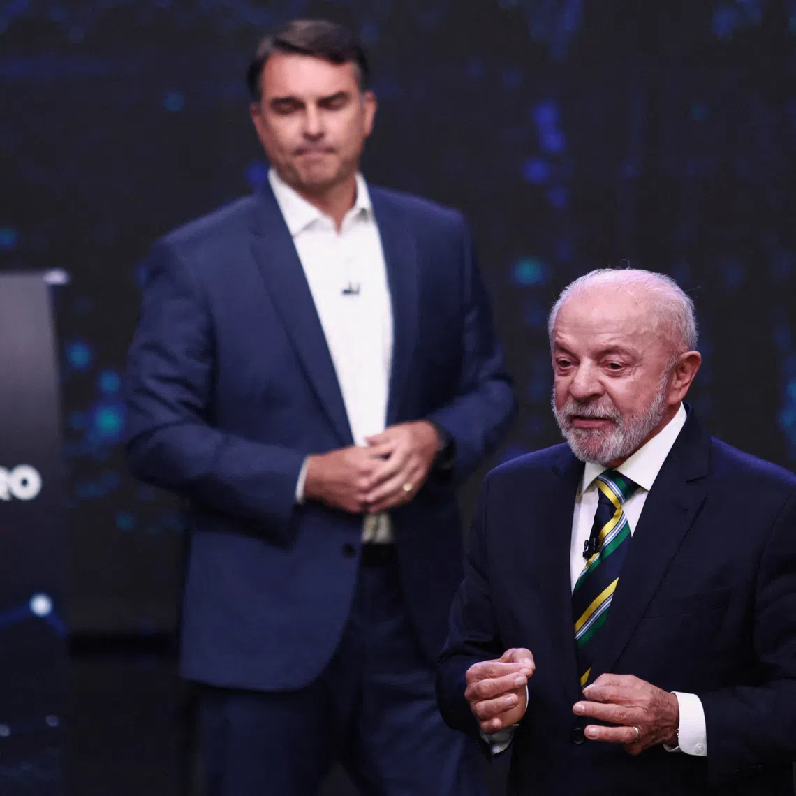Brazilian presidential candidates Flavio Bolsonaro and Luiz Inacio Lula da Silva attend a presidential debate, ahead of the runoff presidential election, in Sao Paulo, Brazil, October 18, 2026. REUTERS/Jean Carniel