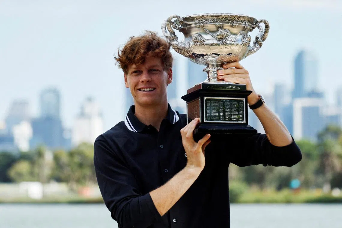 Tennis - Australian Open - Men's Singles Winner Photo Shoot - Albert Park Lake, Melbourne, Australia - January 27, 2025 Italy's Jannik Sinner poses with the Australian Open trophy REUTERS/Francis Mascarenhas