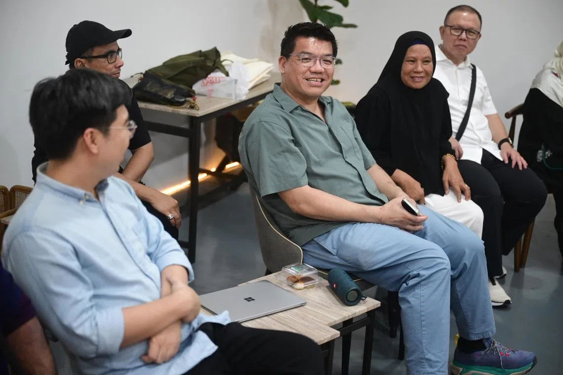 Mr Andrew Joseph Ng (centre) at the programme’s fourth anniversary celebration on Feb 25 at florist Sing See Soon’s Garden Experiential Centre.