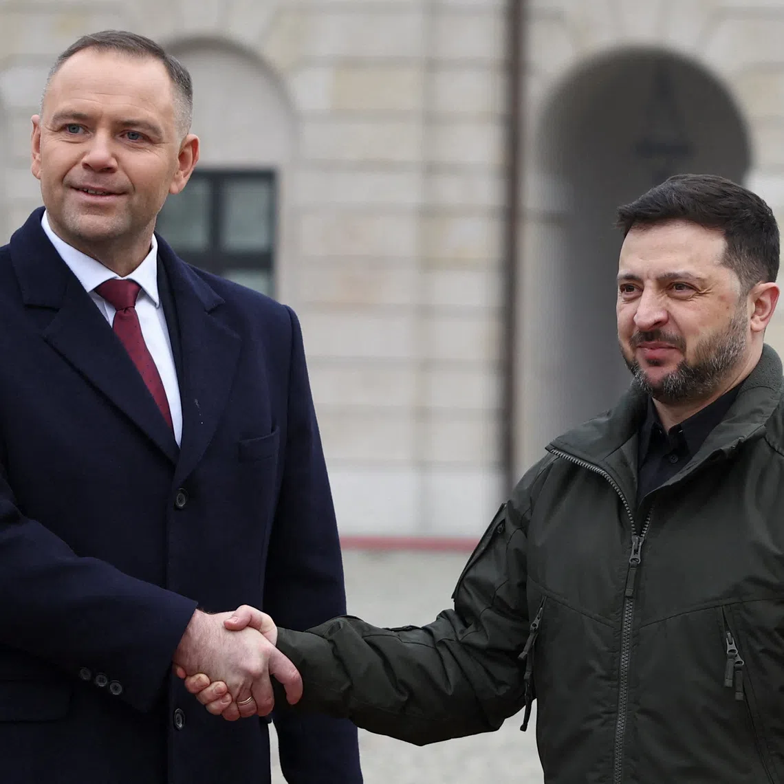 Ukrainian President Volodymyr Zelensky and Polish President Karol Nawrocki at a welcoming ceremony at the courtyard of the Presidential Palace in Warsaw, Poland, on Dec 19.