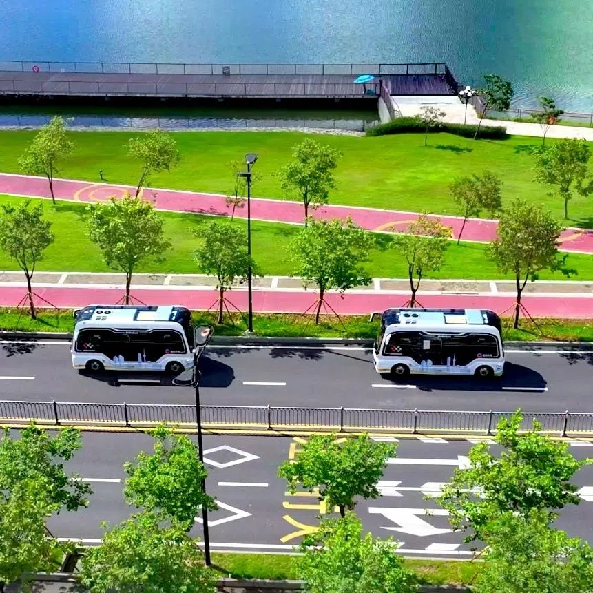 MOGOX buses serving an autonomous driving route between Hengqin island in Zhuhai, in China's Guangdong province, and Macau in 2026.