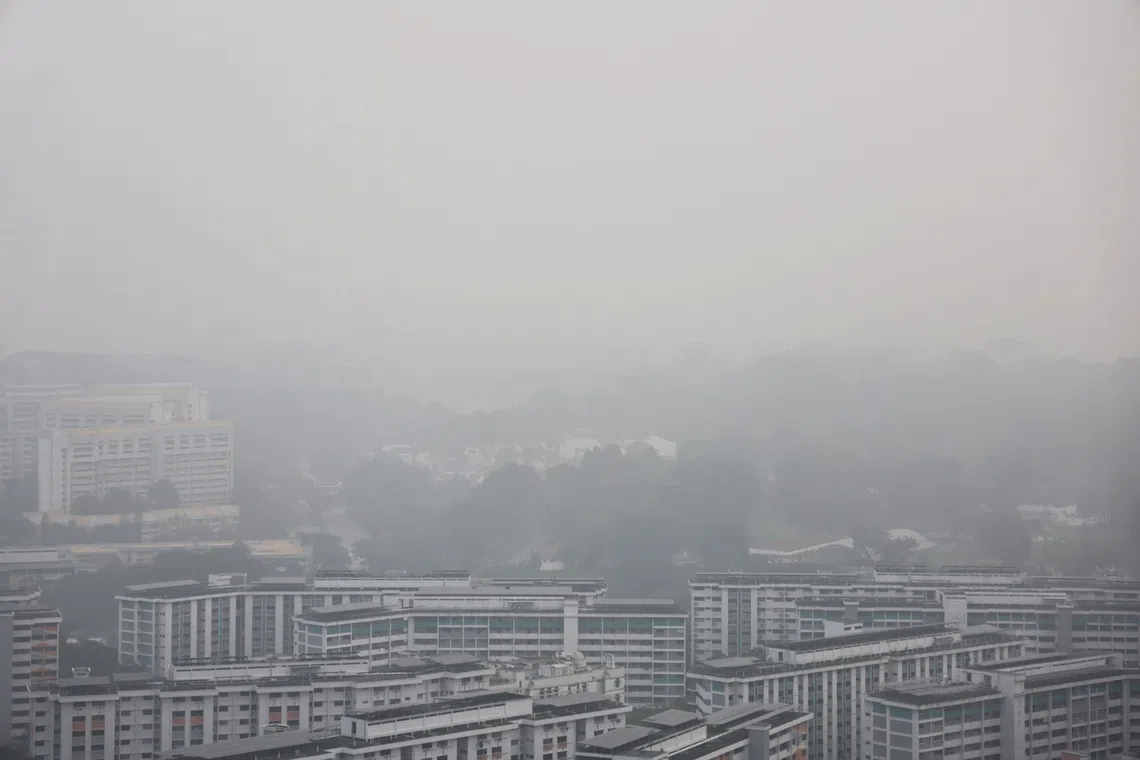 Hazy conditions seen from Clementi rea at about 7.10am on Oct 17.