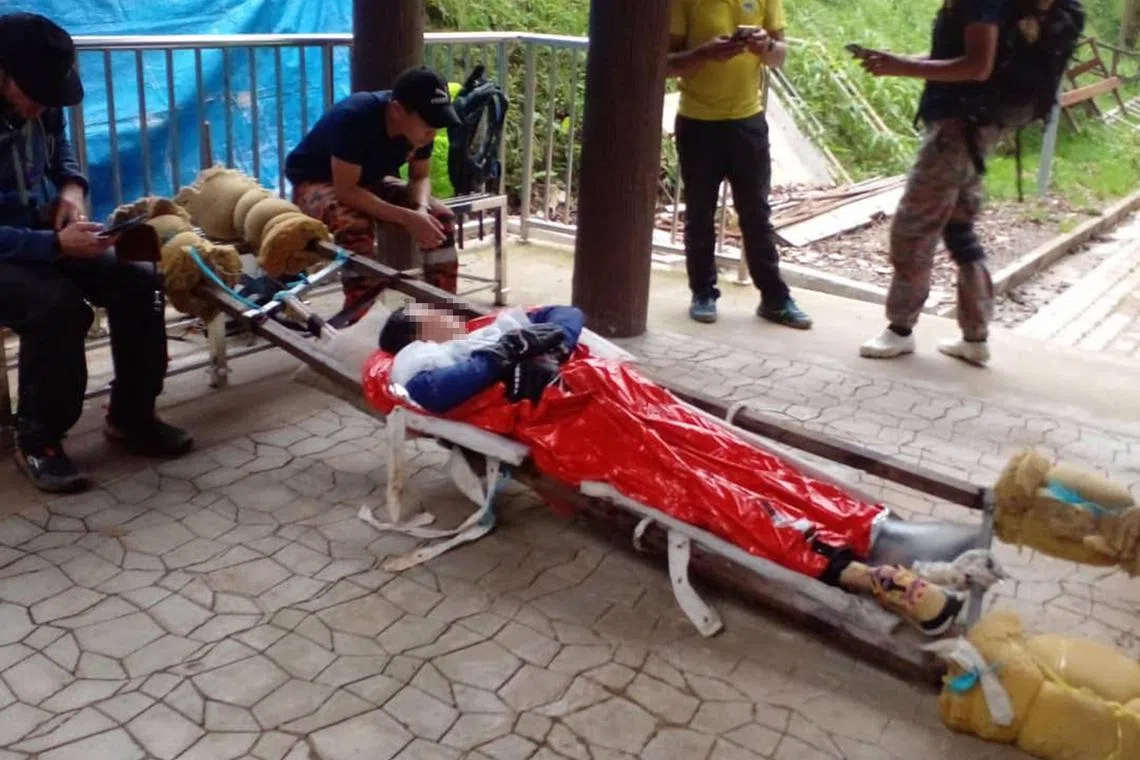 The 41-year-old Singaporean woman was suspected to have broken her left ankle and was taken to the hospital.